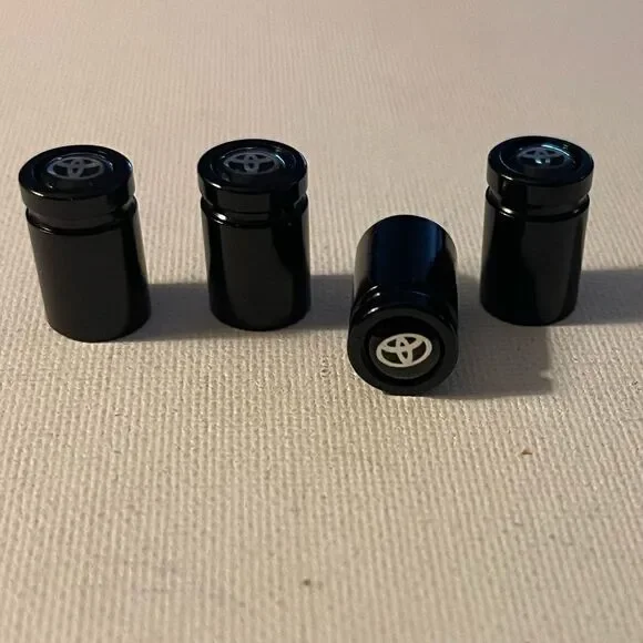 Toyota Logo valve Stem caps in black set of 4 NWT - Picture 3 of 4